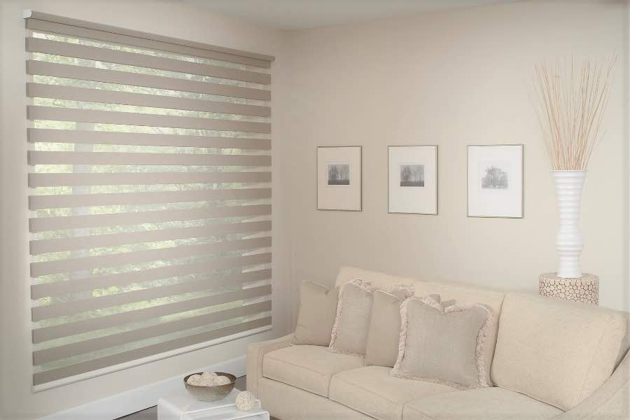 Zebra shades give you a unique combination of light control and style that benefits your Cincinnati home. Zebra shade allows filtered light into a living room