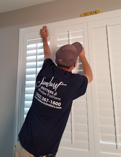 Shutter installation in Cincinnati bedroom.