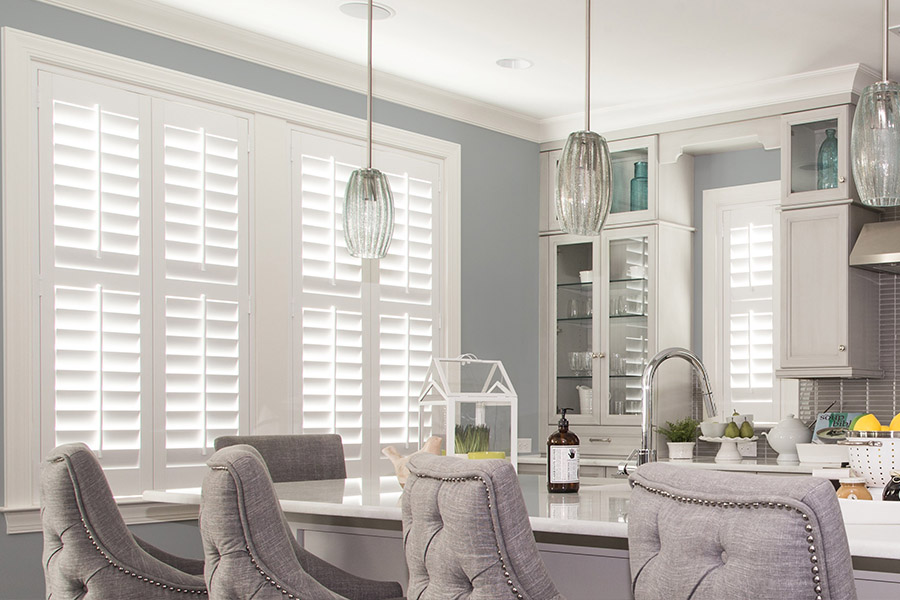 White Polywood shutters in a large modern kitchen