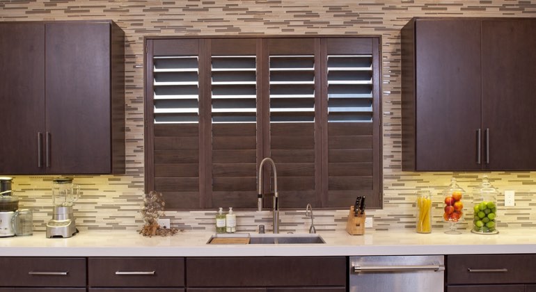 Divider rail shutters in a Cincinnati kitchen. Cincinnati cafe kitchen shutters
