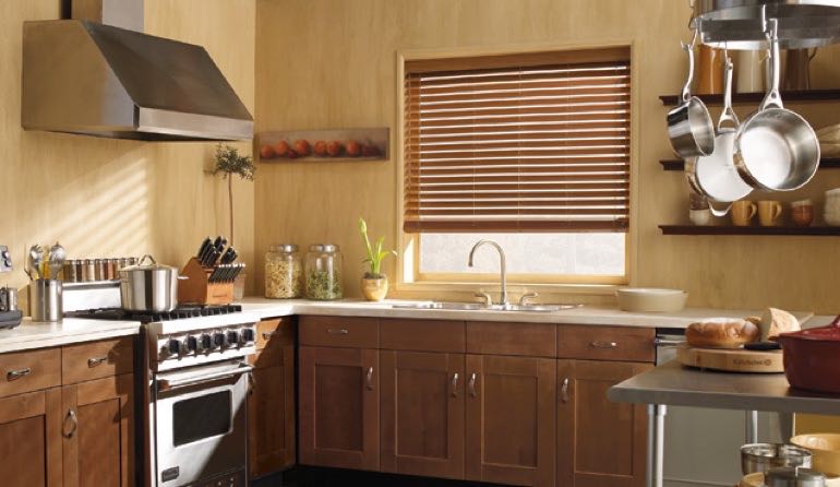 Faux wood blinds look beautiful in Cincinnati kitchens. Cincinnati kitchen faux wood blinds.