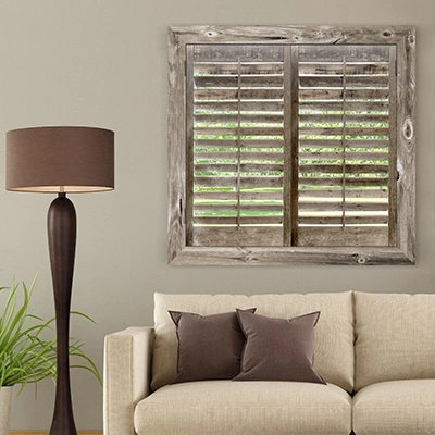 Reclaimed wood shutters above a modern couch