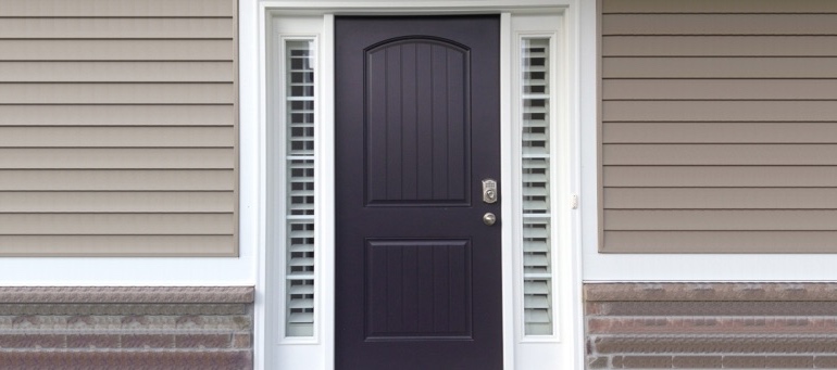 Entry Door Sidelight Shutters In Cincinnati, OH Entry Door Sidelight Shutters Next To Black Door In Cincinnati, OH